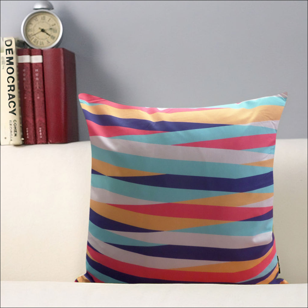 Cojín decorativo multicolor que aporta confort, estilo y calidez al hogar. Su textura agradable y material resistente lo hacen ideal para salas y dormitorios, mejorando el descanso y renovando la decoración diaria.